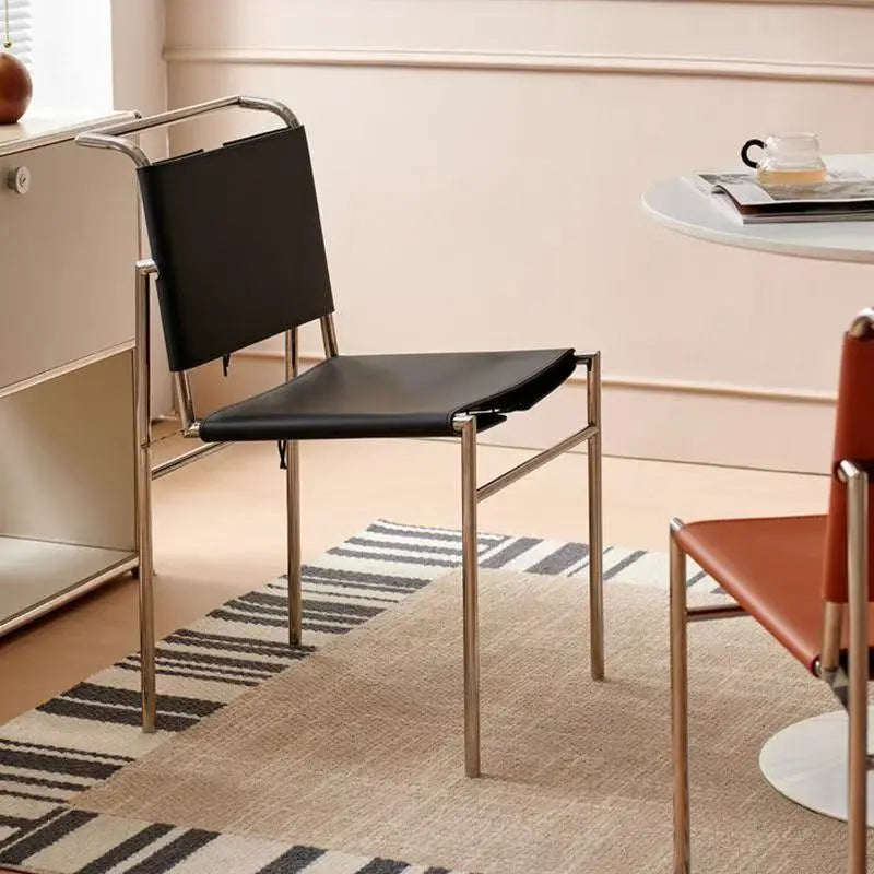 Italian minimalist saddle leather dining chair stainless steel chair Nordic designer light luxury restaurant