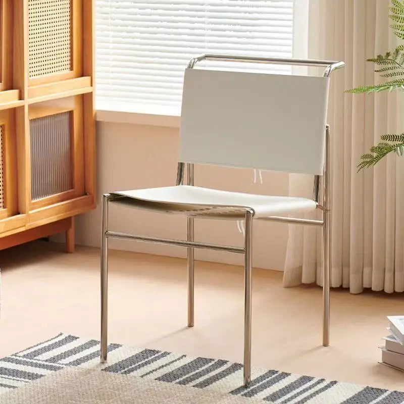 Italian minimalist saddle leather dining chair stainless steel chair Nordic designer light luxury restaurant